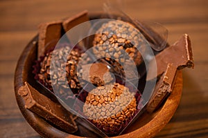 Fine sweets for wedding party in wooden bowl. Selective focus.