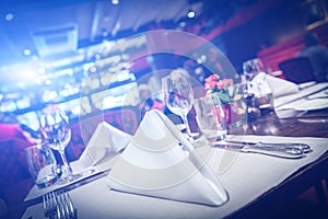 Fine table setting with blue light flare