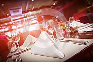 Fine table setting with red light flare