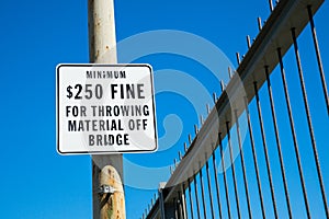 Fine for throwing material off bridge