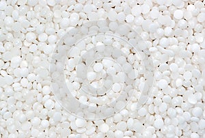 Fine white polymer granules