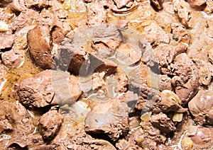 Finely chopped poultry fryied liver. Close-up texture. photo