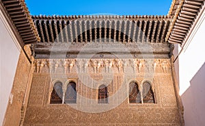 Finely decorated facade in the Alhambra Palace in Granada. Andalusia, Spain.