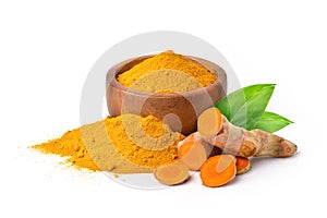 Finely dry Turmeric powder in wooden bowl with  rhizome