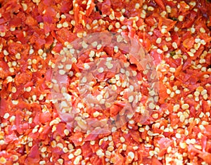 Finely red pepper texture and surface, close-up