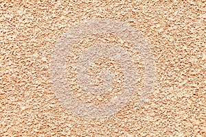 Finely Textured Stucco Background in Peachy Beige Color photo