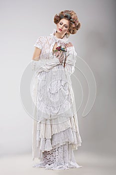 Finery. Glamorous Lady in Elegant Lacy Dress