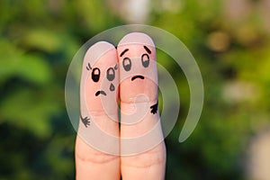 Finger art of displeased couple.