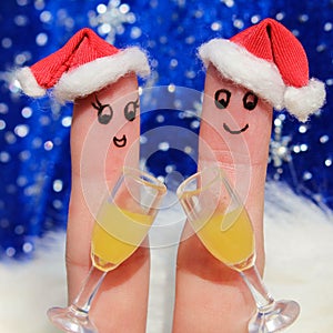 Finger art of a Happy couple. Couple making good cheer. Two glasses of champagne.