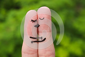 Finger art of a Happy couple. The happy couple kissing and hugging