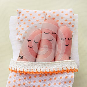 Finger art, happy man sleeps with two women.