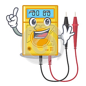 Finger digital multimeter sticks to the cartoon wall