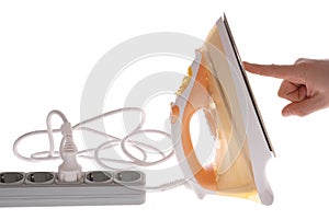 Finger on an electric iron