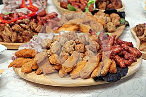 Finger food buffet with meat rolls photo