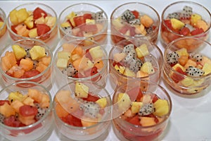 Finger food dessert : Fresh fruits salad in glass bowl
