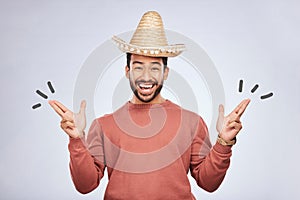 Finger gun, hat and portrait of man in studio with hand gesture for comic, humor and funny joke. Happy, Mexican party