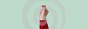 finger heart gesture, web banner format