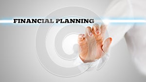 Finger Highlighting Financial Planning Words