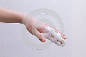 Finger immobilizer after hand injury. Retainer for recovery the hand