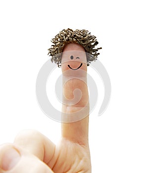 Finger with a laughing face