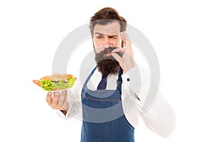 Finger licking good. Bearded man enjoy food taste. Cook chef taste cooked dish. Taste testing. Meals that cater to every photo