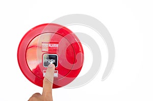 The finger of man Press the button fire alarm