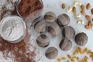 Finger millet ladus. Delicious and nutritious ragi flour ladoos adorned with almonds, cashews, and raisins. A wholesome Indian