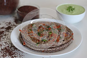 Finger millet or Ragi uthappam. Healthy pan cake made of fermented batter of finger millet and lentils