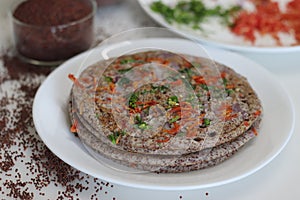 Finger millet or Ragi uthappam. Healthy pan cake made of fermented batter of finger millet and lentils