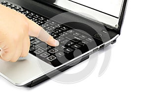 Finger point on computer keyboard