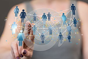 Finger pointing on 3d floating connected people icons - a concept of networking, HR, communication