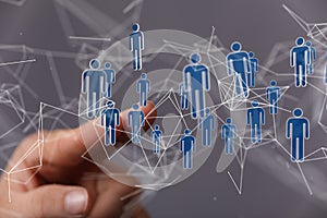 Finger pointing on 3d floating connected people icons - a concept of networking, HR, communication