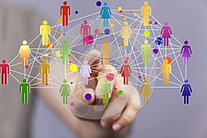Finger pointing on 3d floating connected people icons - a concept of networking, HR, communication