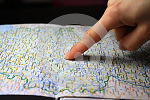 Finger pointing destination target on map