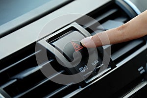 Finger pressing car emergency button