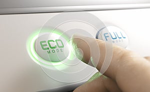 Finger pressing eco mode button. Energy saving concept