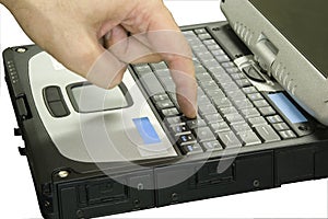 Finger pressing laptop key