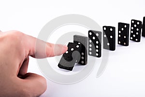 Unleashing the Domino Effect: A Chain Reaction in Motion photo