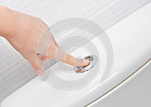 Finger pushing button and flushing toilet