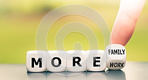 Finger turns dice and changes the expression `more work` to `more family`.