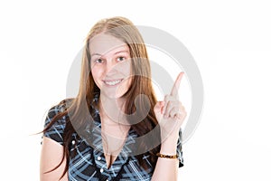 Finger up pointing cute pretty smiling beautiful young woman looking to camera happy smiling on white background
