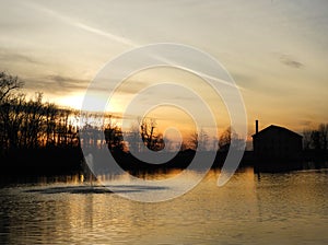 Fingerlakes pond reflection during winter sunset