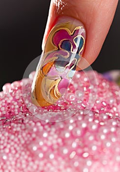 Fingernail with beautiful multilayer manicure photo