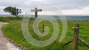 Fingerpost on the South Downs Way with Brighton in the distance photo