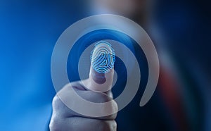 Fingerprint scan provides security access with biometrics identification. Business Technology Safety Internet Concept photo
