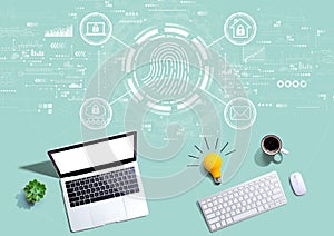 Fingerprint scanning theme with computers with a light bulb