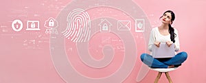 Fingerprint scanning theme with woman using a laptop