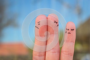 Fingers art of couple after an argument looking in different directions. Idea of family during conflict. photo