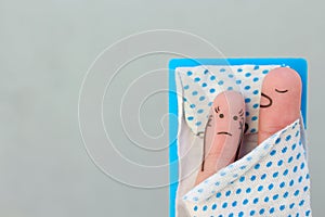 Fingers art of couple in bedroom. Concept of snoring husband annoys his wife