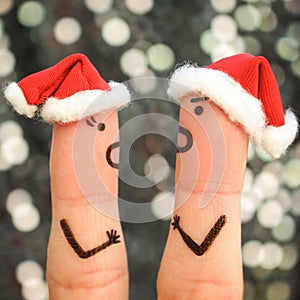 Fingers art of couple celebrates Christmas.